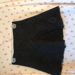 Super cute black miniskirt with lace outer design
